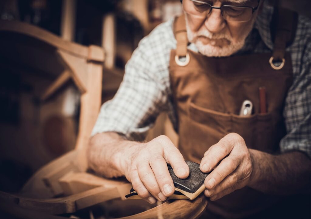 An elderly enjoying woodworking.