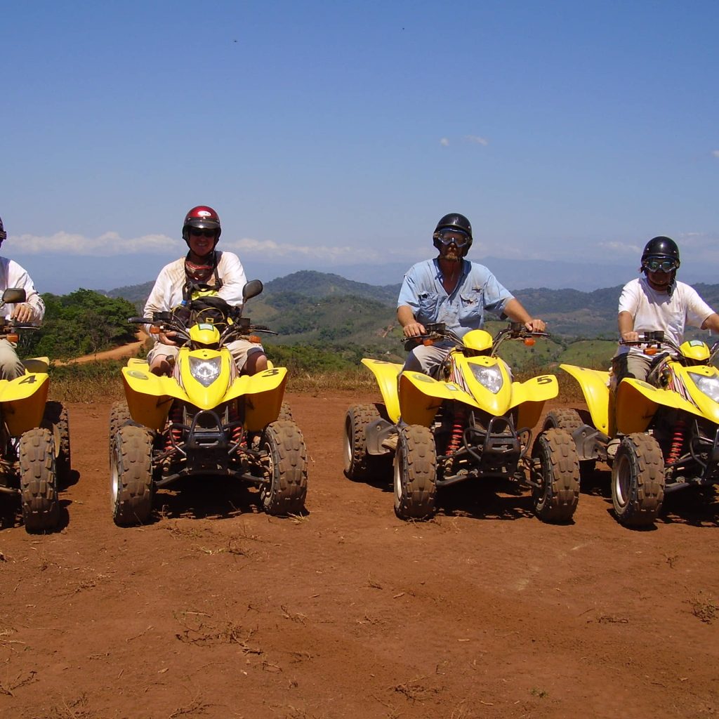 Tourists participating in an ATV tour of Jaco Beach in Costa Rica.