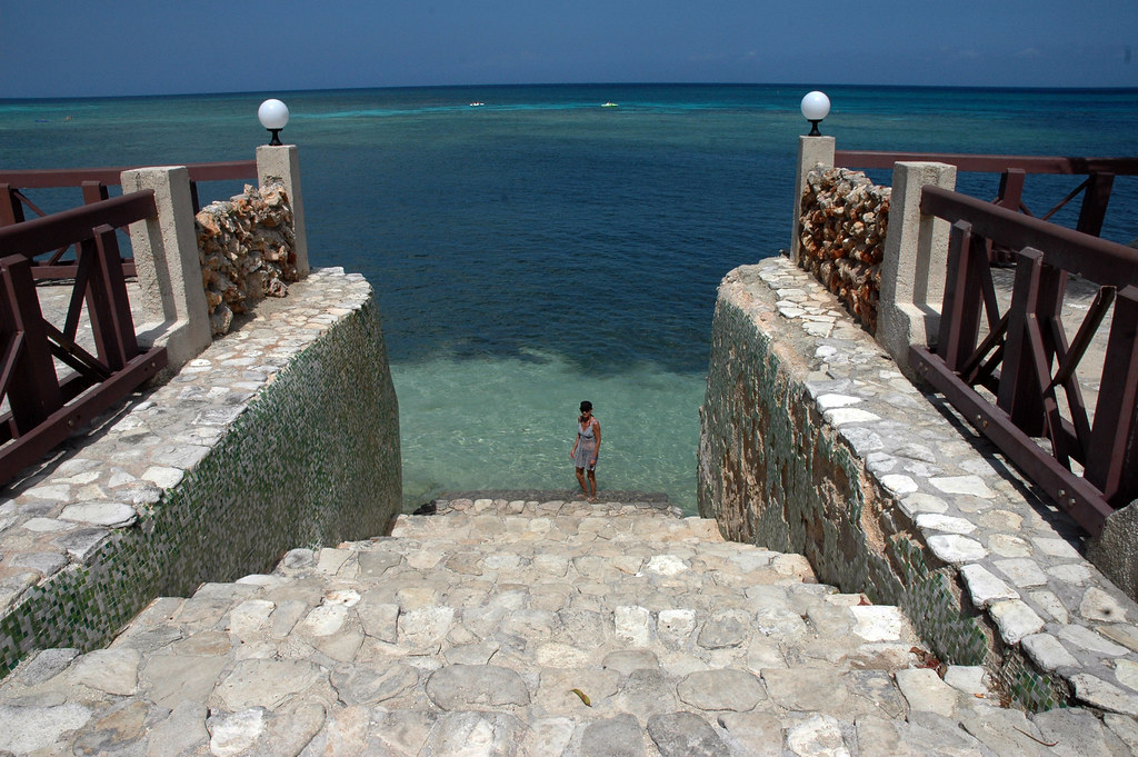 An image of a resort's stone steps towards a beach in Guardalavaca.