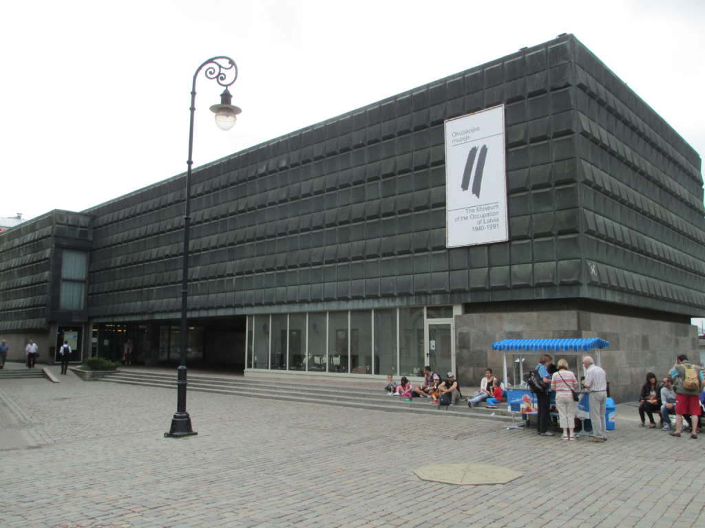 An image of tourists visiting the Museum of the Occupation. One of many locations in the senior-vacation guide to latvia. 