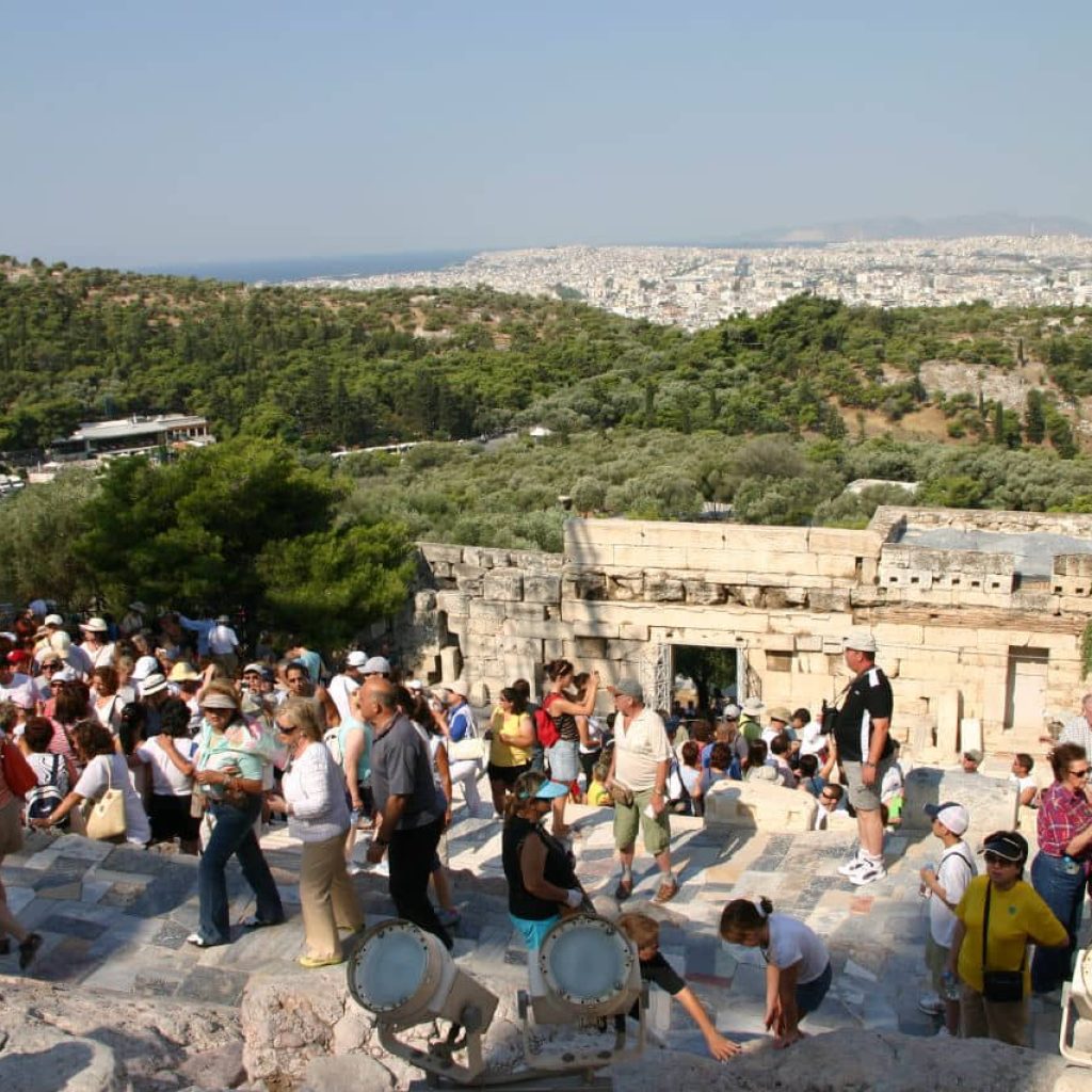An image of tourists taking part in a senior vacation to Athens.