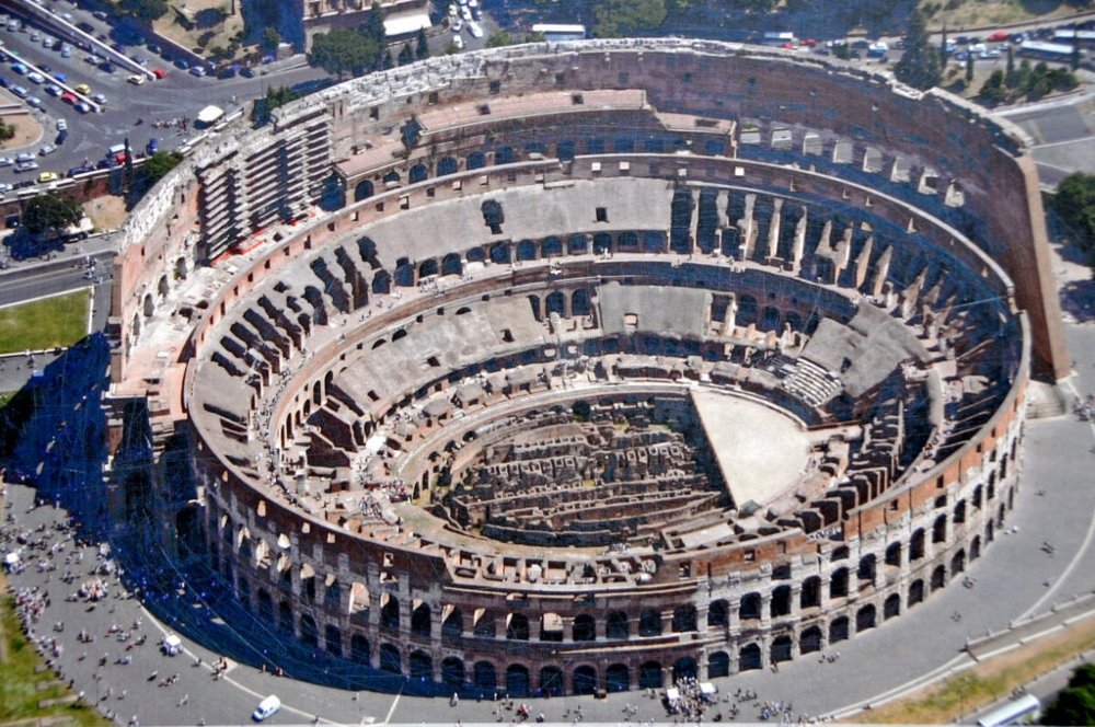 An aerial view of the colosseum for an article about "senior travels to rome."