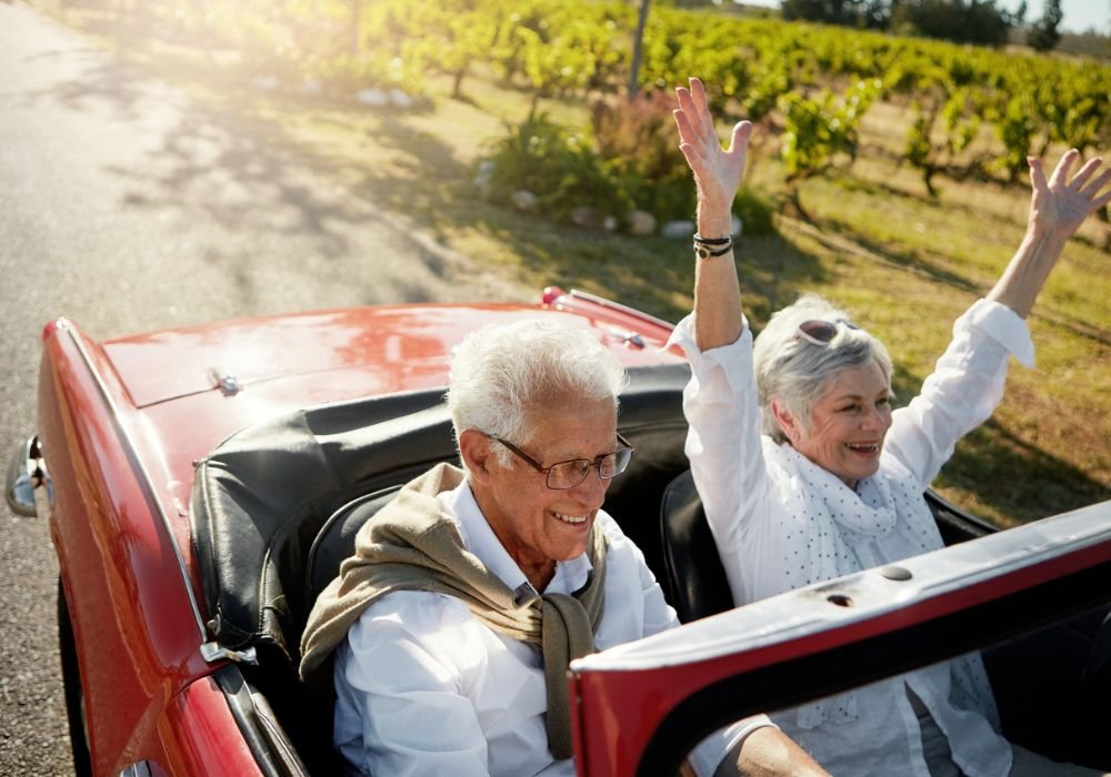 An image of retired couples driving for an article about how to find purpose in retirement.