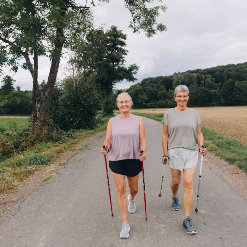 An image of two women going for a walk for an article about accessible travel for seniors.