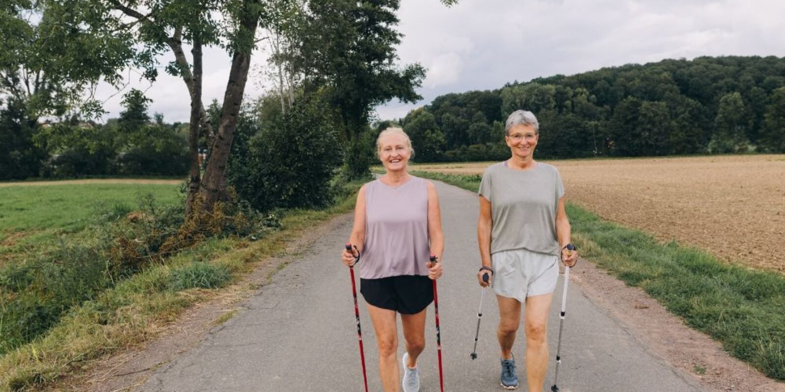 An image of two women going for a walk for an article about accessible travel for seniors.